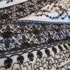 bestickter Schal mit gewebtem Muster